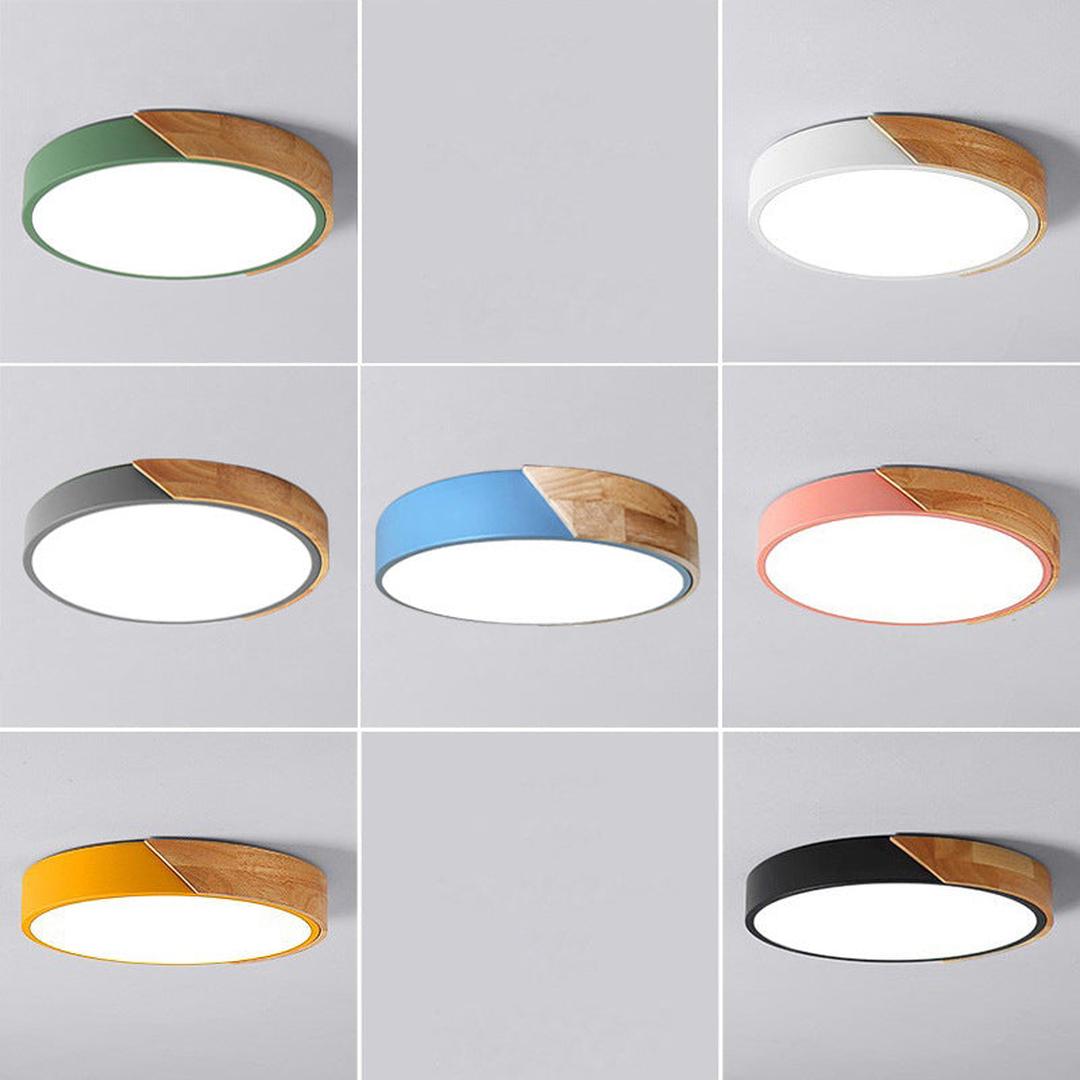 Rund LED-taklampe i akryl med farget metallkant