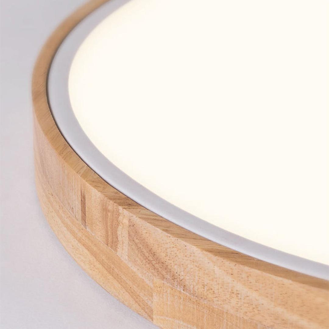 Rund LED-taklampe i akryl med farget metallkant