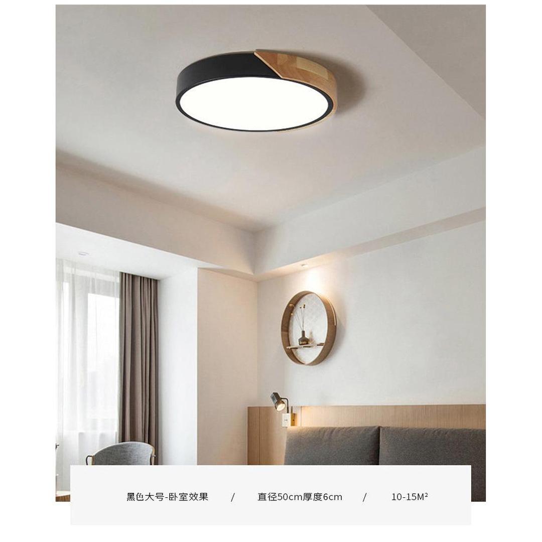 Rund LED-taklampe i akryl med farget metallkant