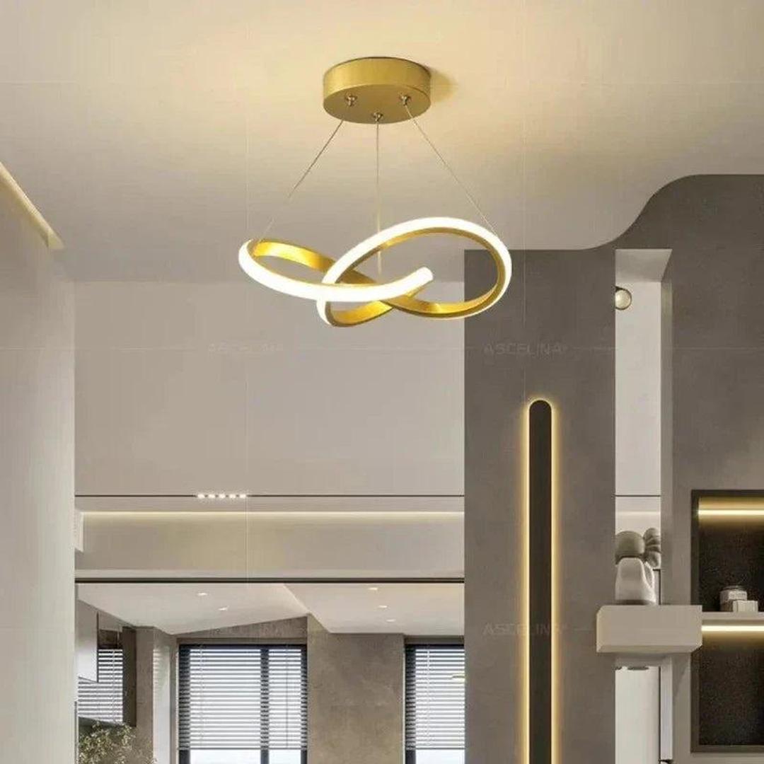 LED-taklampe med bølgeformet lysbånd hengt fra en rund takplate