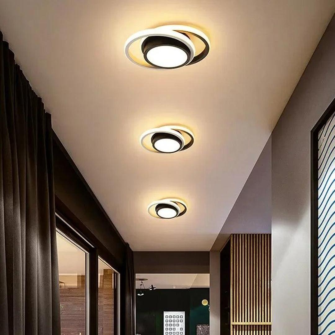 Liten LED-taklampe bygget opp av to lysende ringer