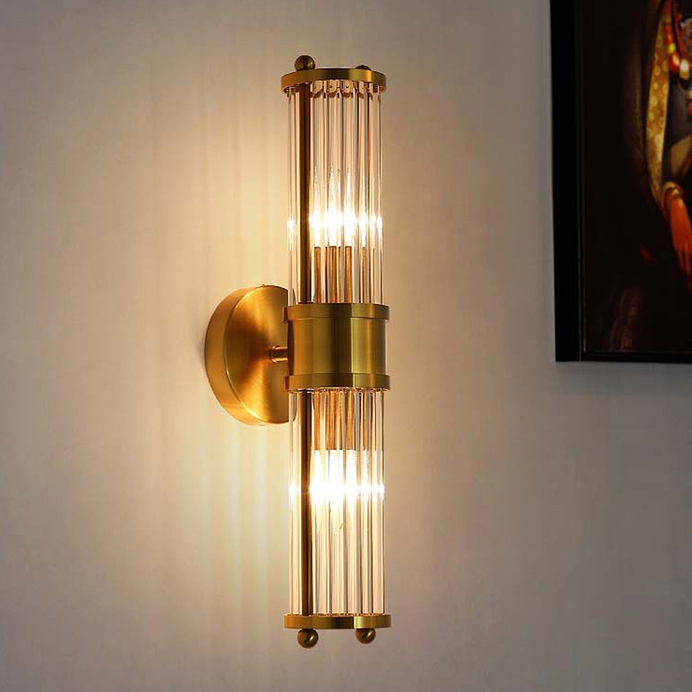 Gyllora - Slank vegglampe i gullfarget finish