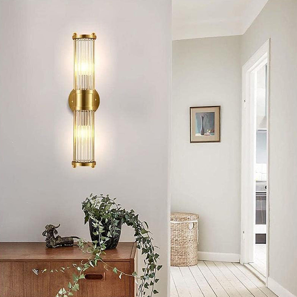 Gyllora - Slank vegglampe i gullfarget finish